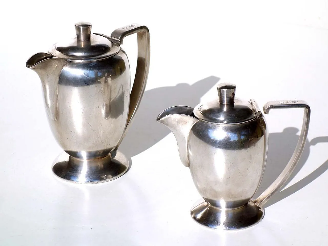 Pair of silver Alpacca Hotel teapots, 1920s 2