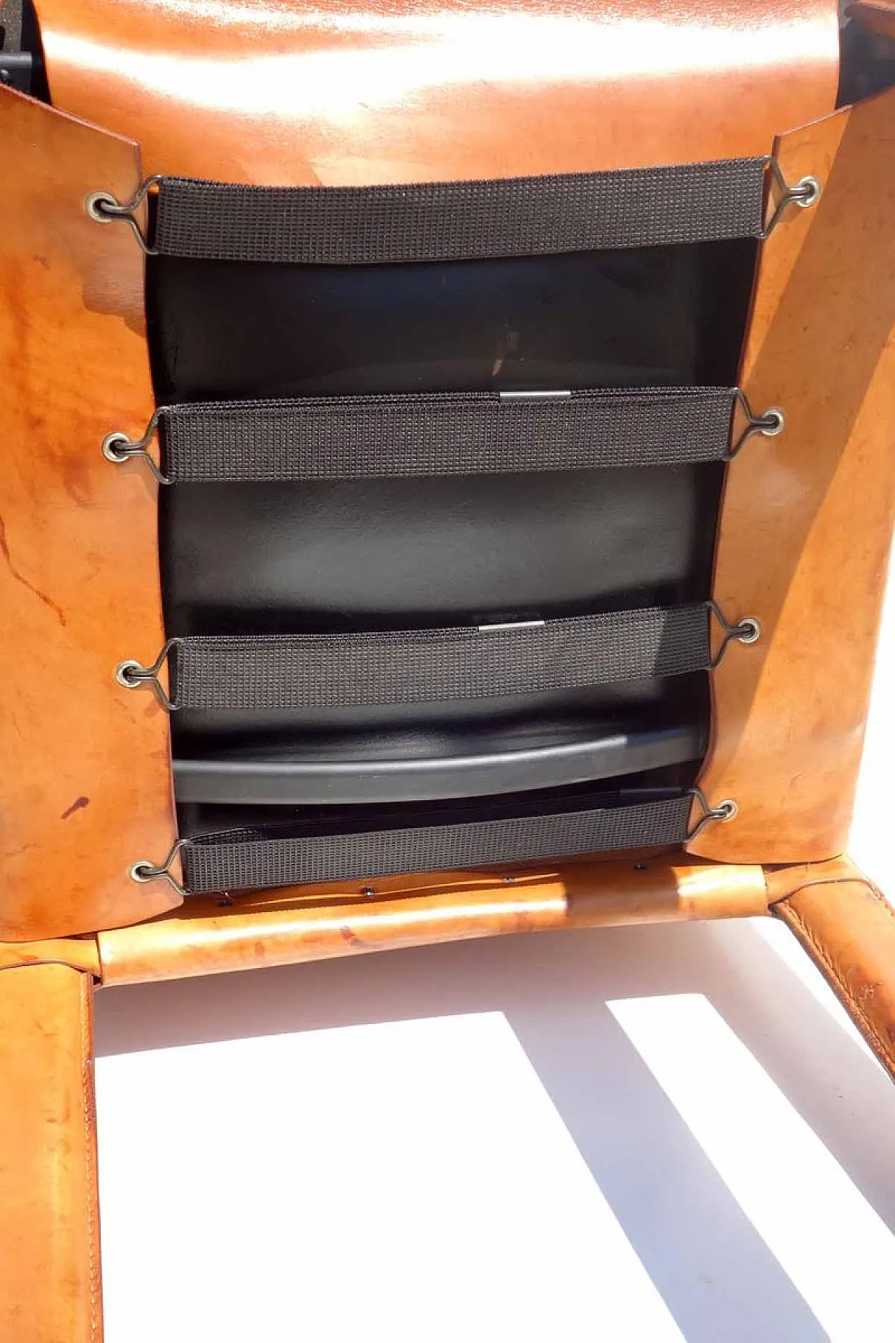 Cognac leather chair, 1970s 8