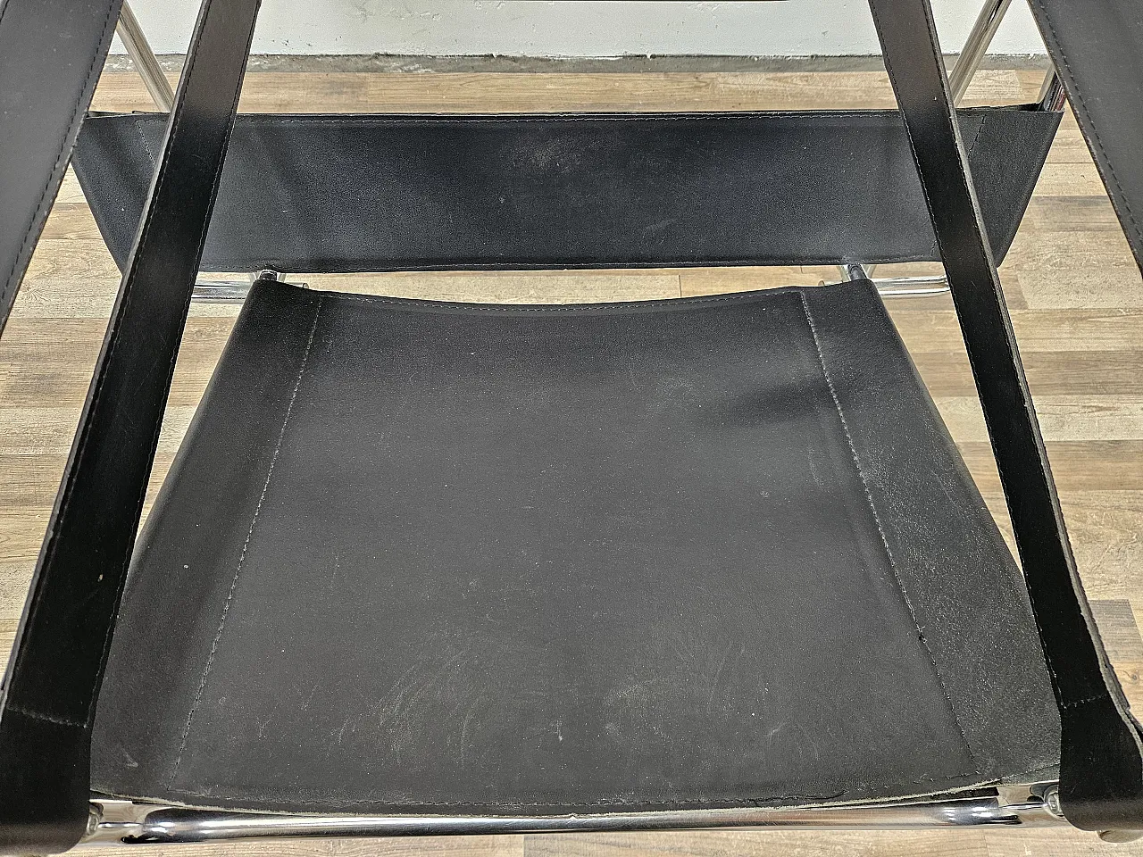 Armchair in chromed tubular and black leather, 70s 12