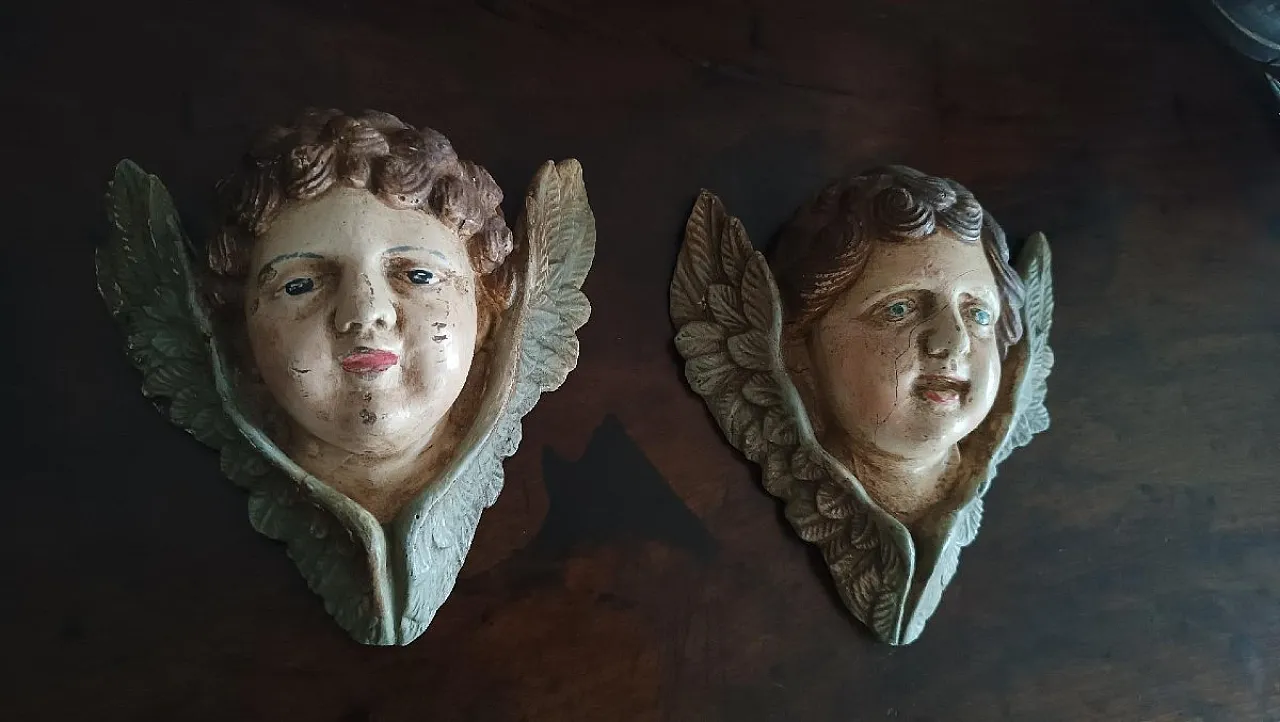 Coppia di volti d'angelo in gesso e legno policromo, fine '800 1