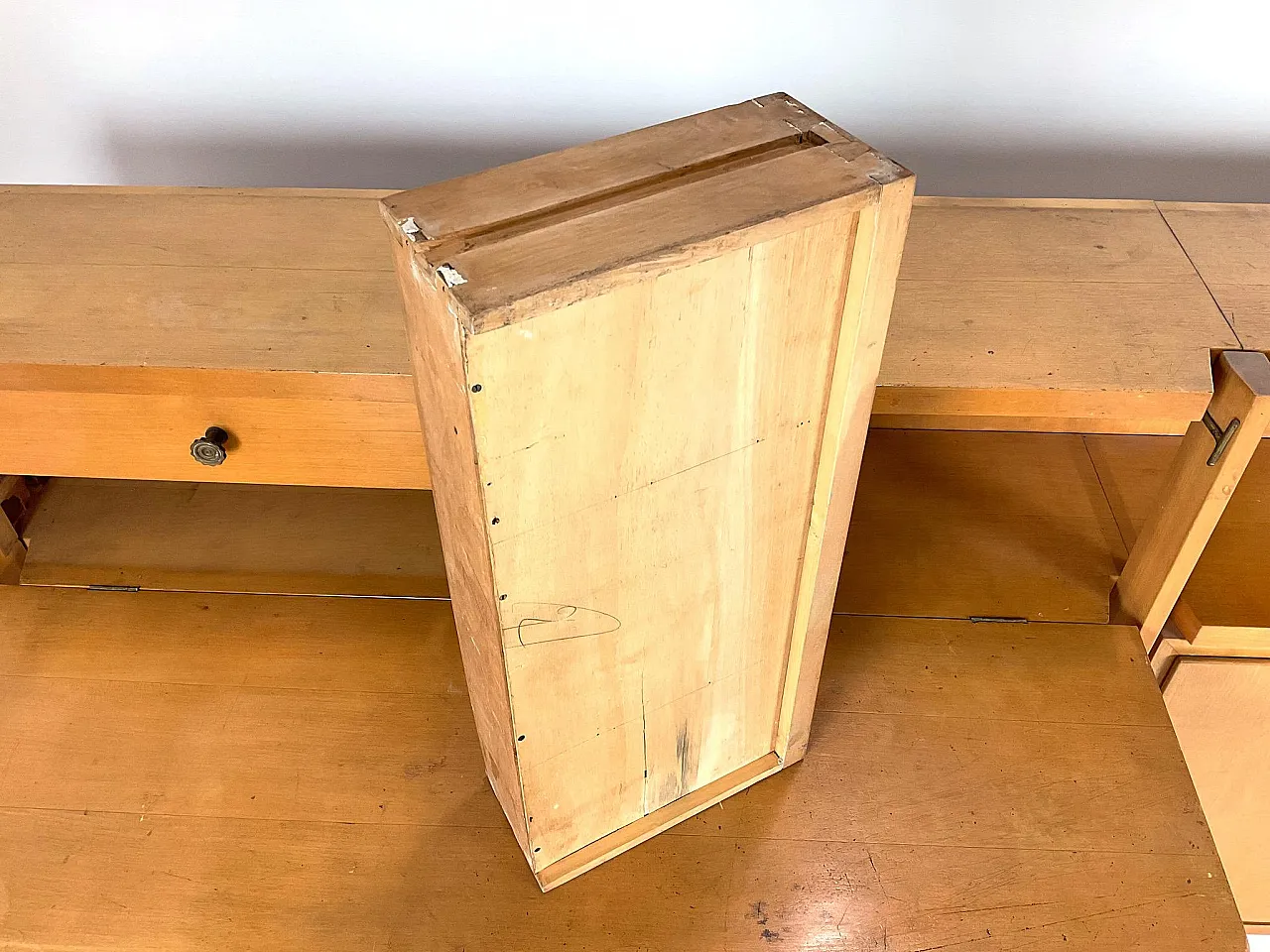 Cabinet with drop-down desk and hanging corner bookcase, 1950s 9