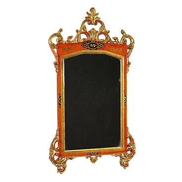 Tuscan mirror red and golden lacquered, 20th century