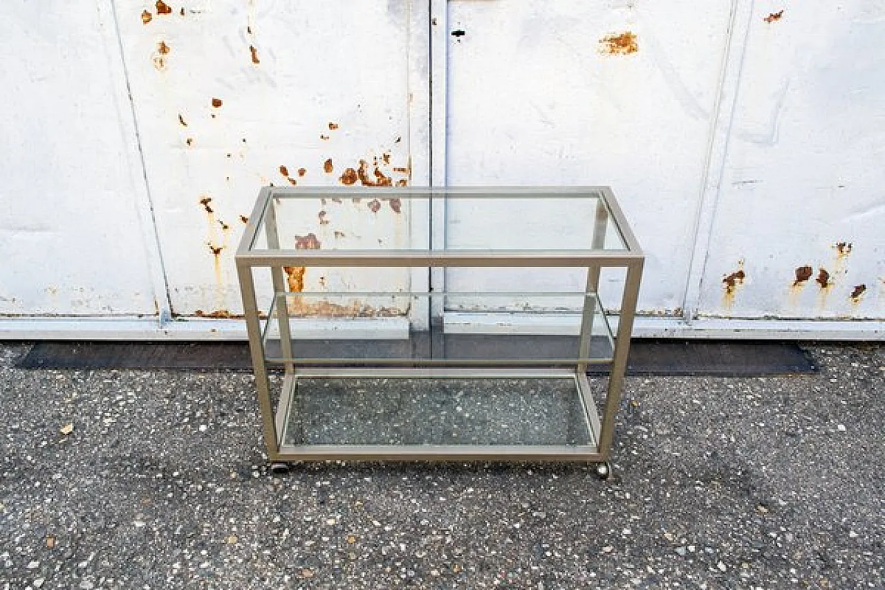 Consolle in ottone e vetro con rotelle, anni '70 4