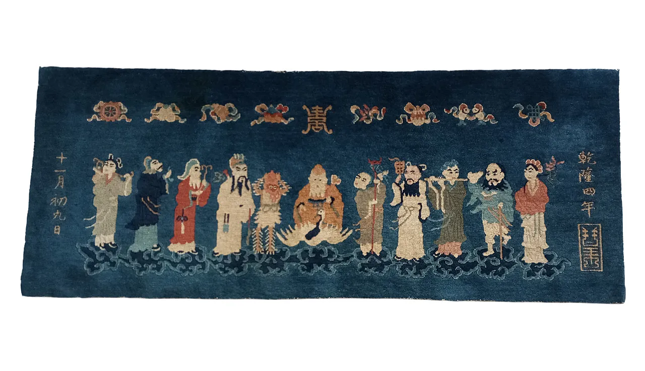 Oriental rug figured with inscriptions and symbols, in wool China, 50s 1