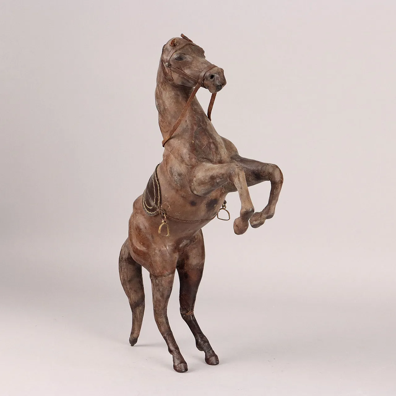 Leather-clad prancing horse, 20th century 1