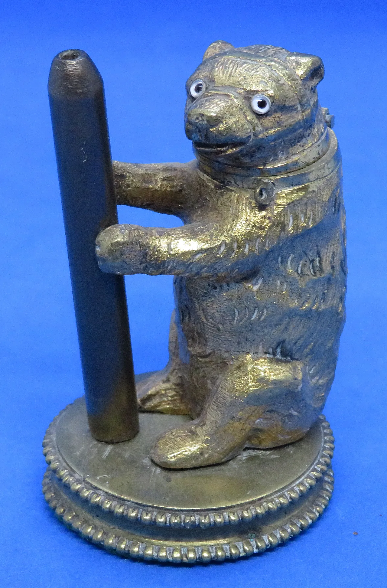 Gilded metal match bear, 19th century 1