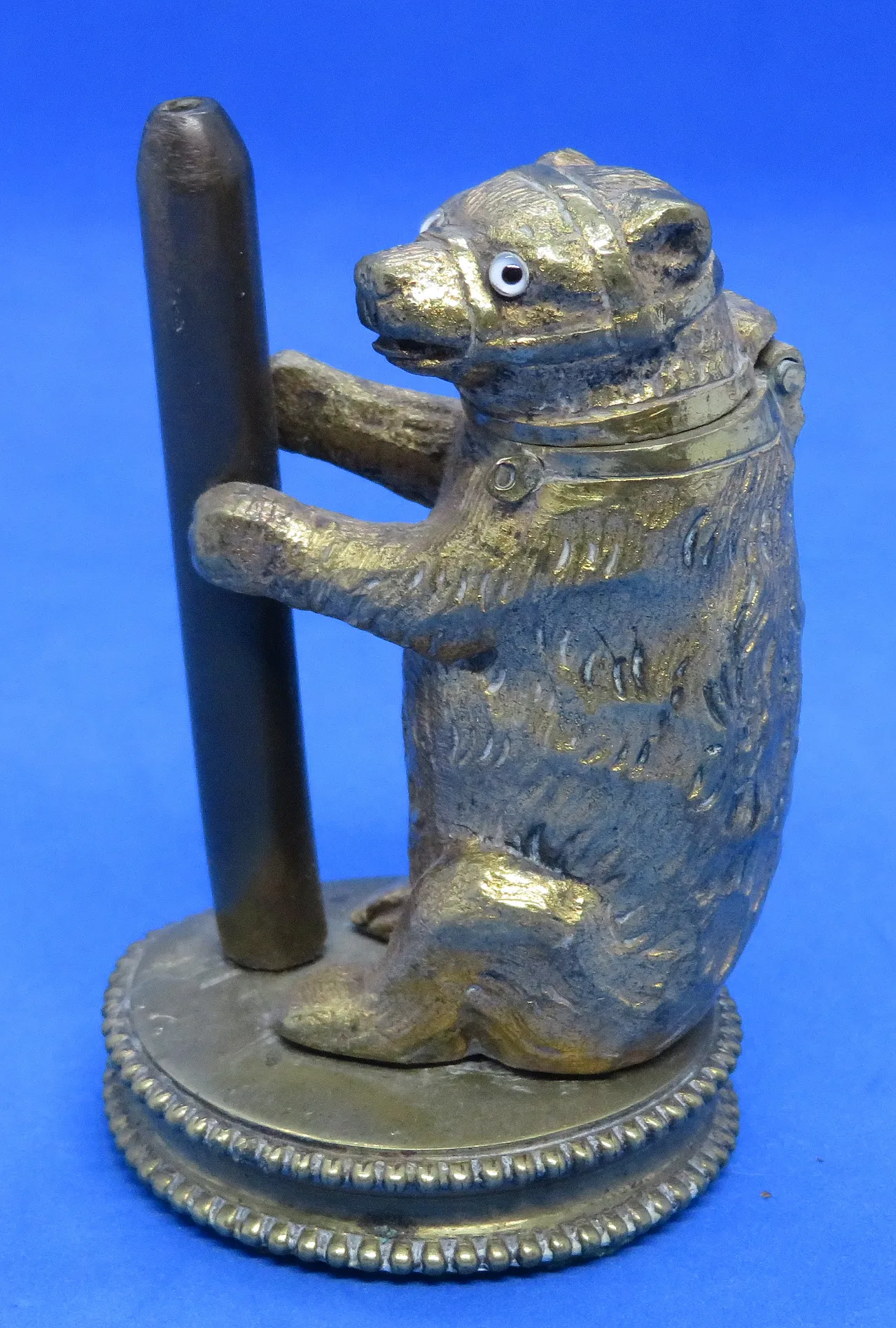 Gilded metal match bear, 19th century 2