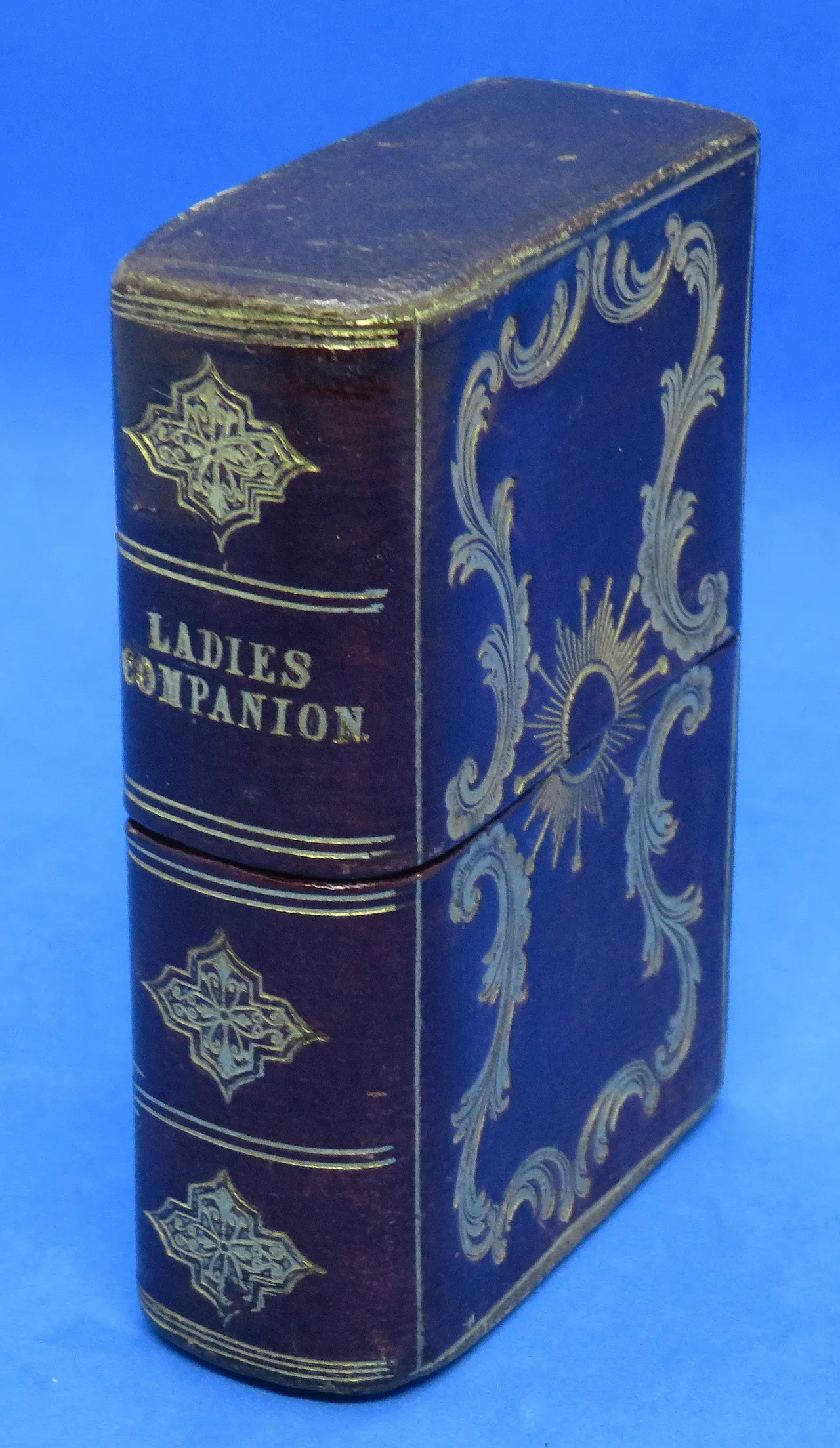 Tooled maroon leather sewing set, 19th century 1