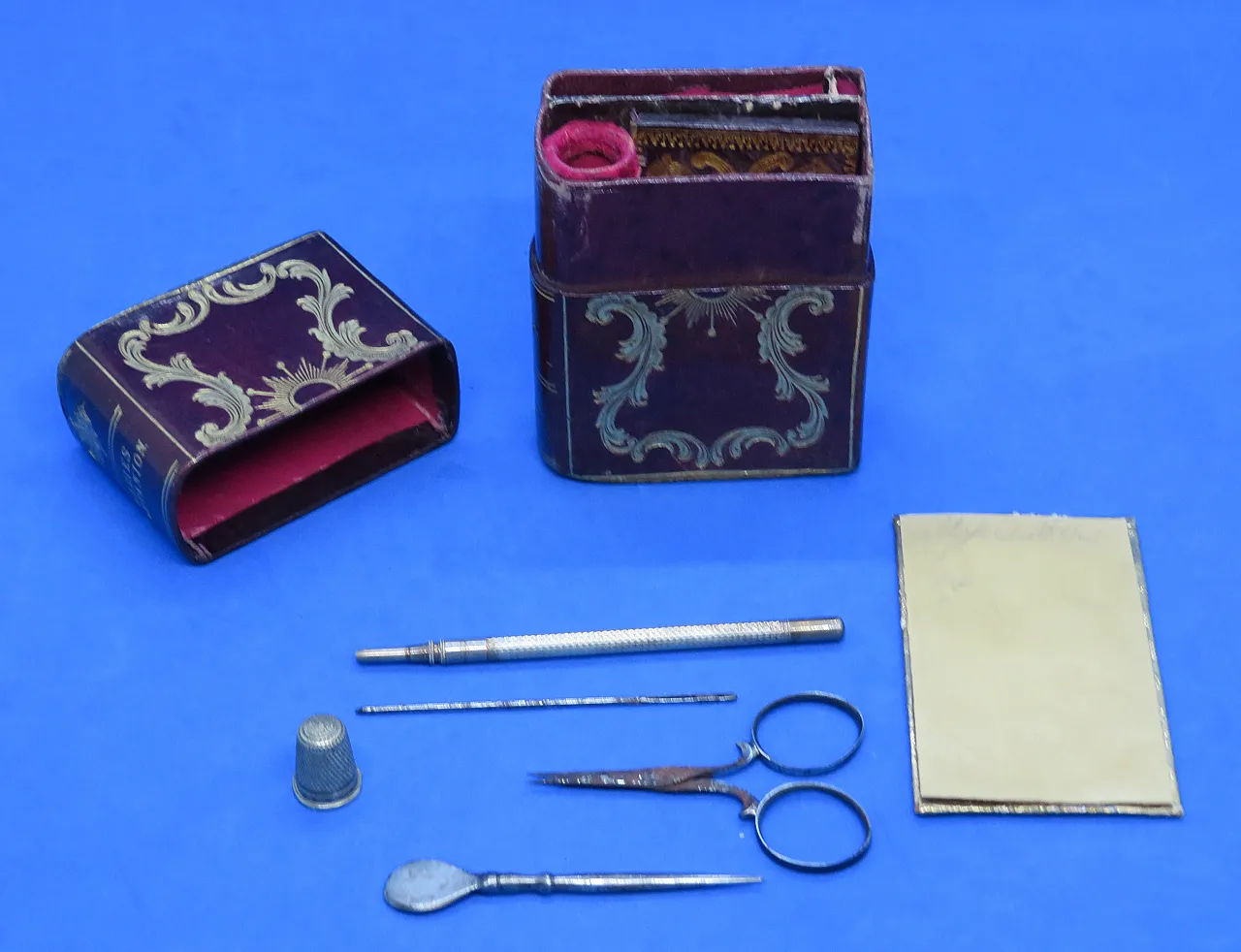 Tooled maroon leather sewing set, 19th century 10