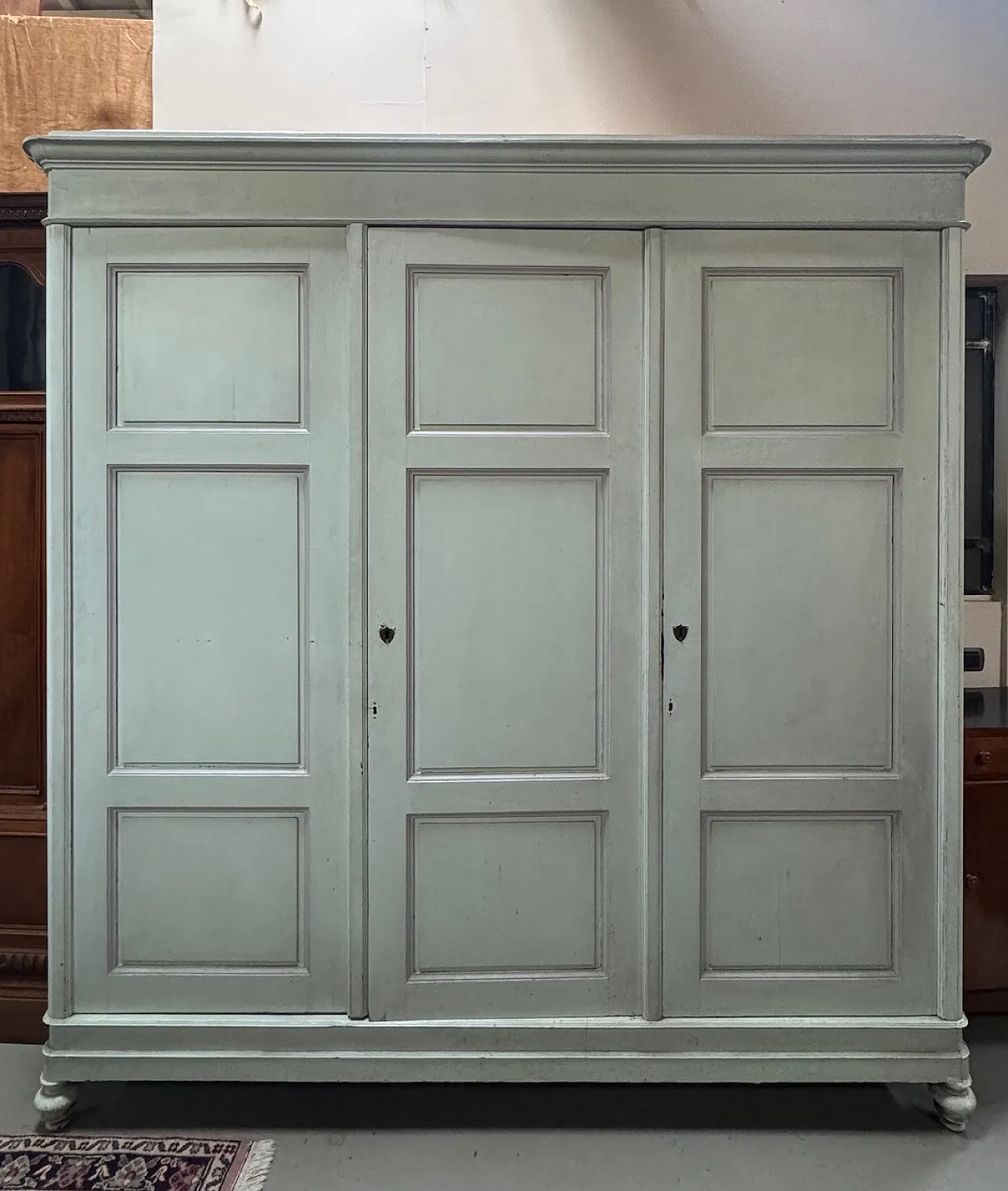 Green mastic cabinet with three doors, 19th century 1