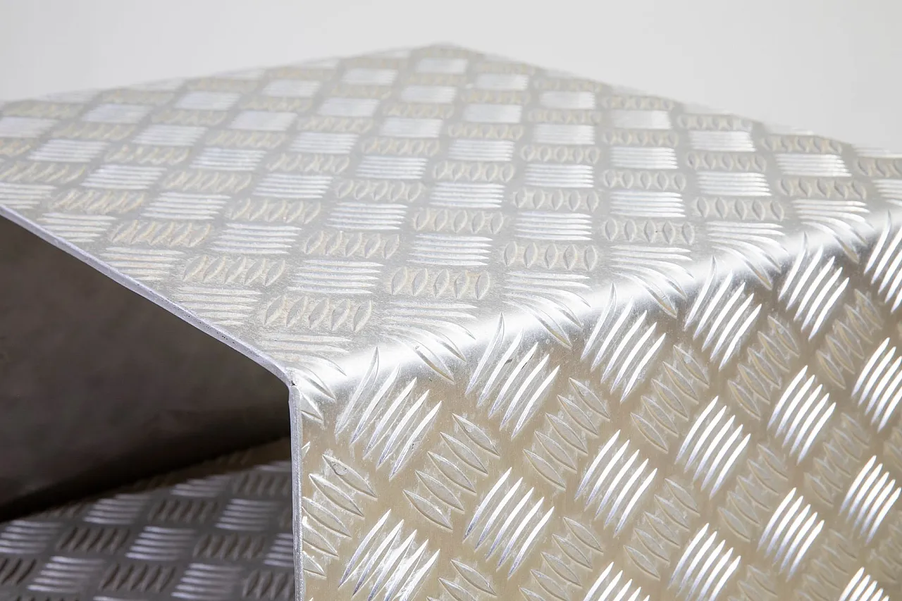 Pair of bedside tables in curved and diamond-cut steel, 1990s 4