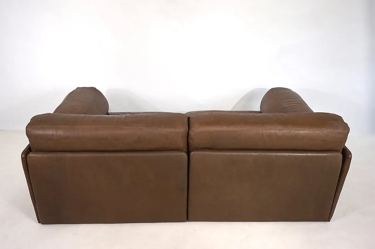 Two-seater leather sofa bed by De Sede, 1970s 11