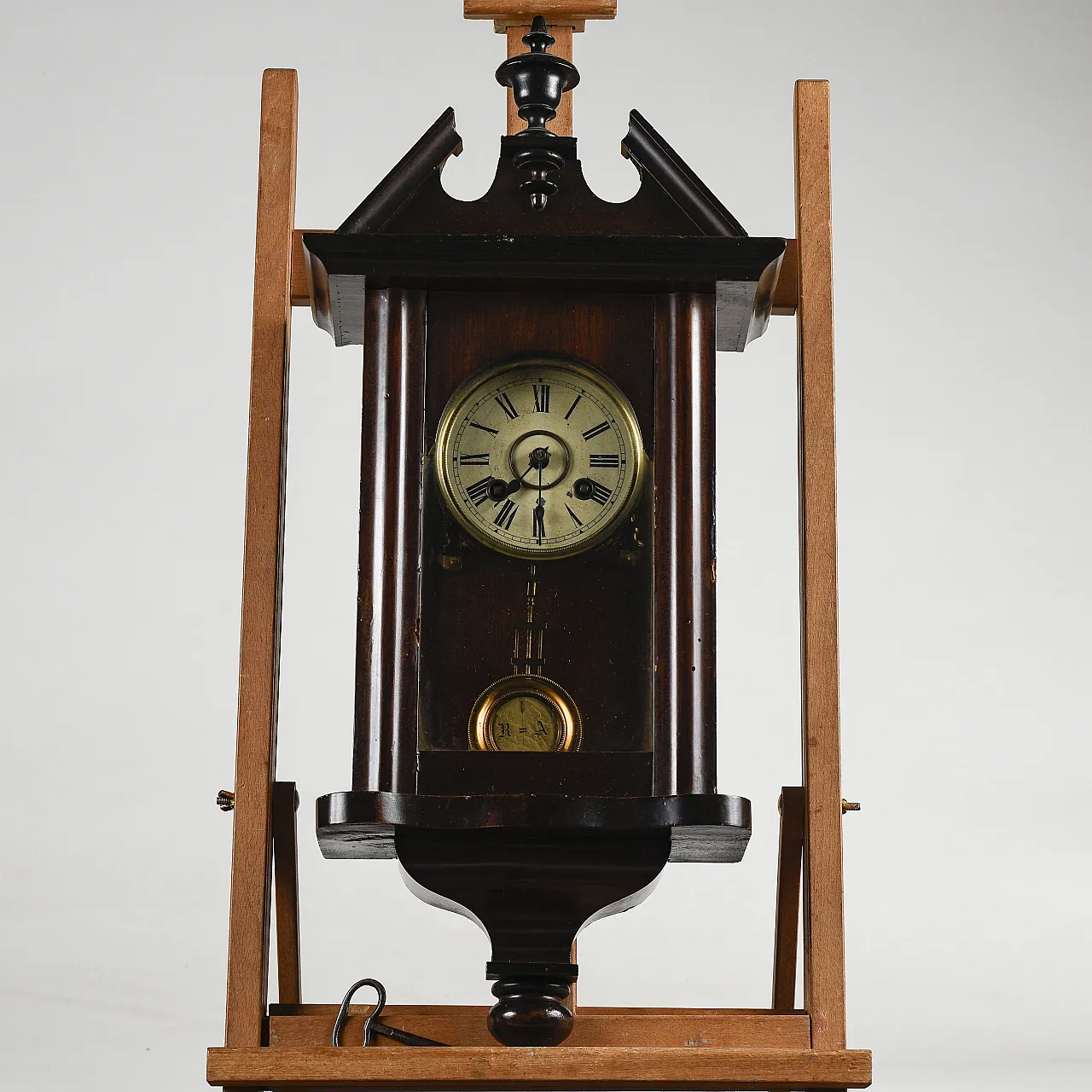 Wooden wall pendulum clock with winding key, 19th century 1