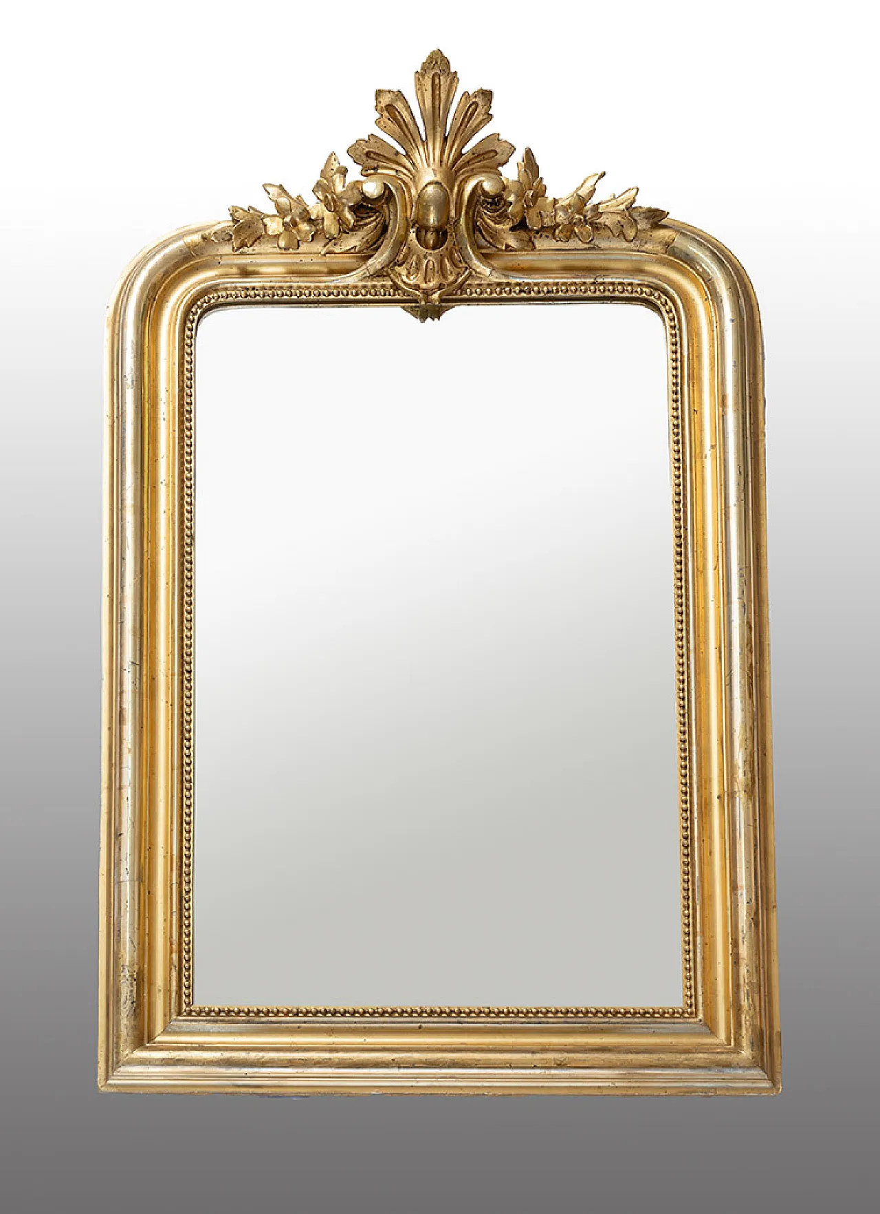 Ancient mirror Napoleon III in golden and carved wood. 1