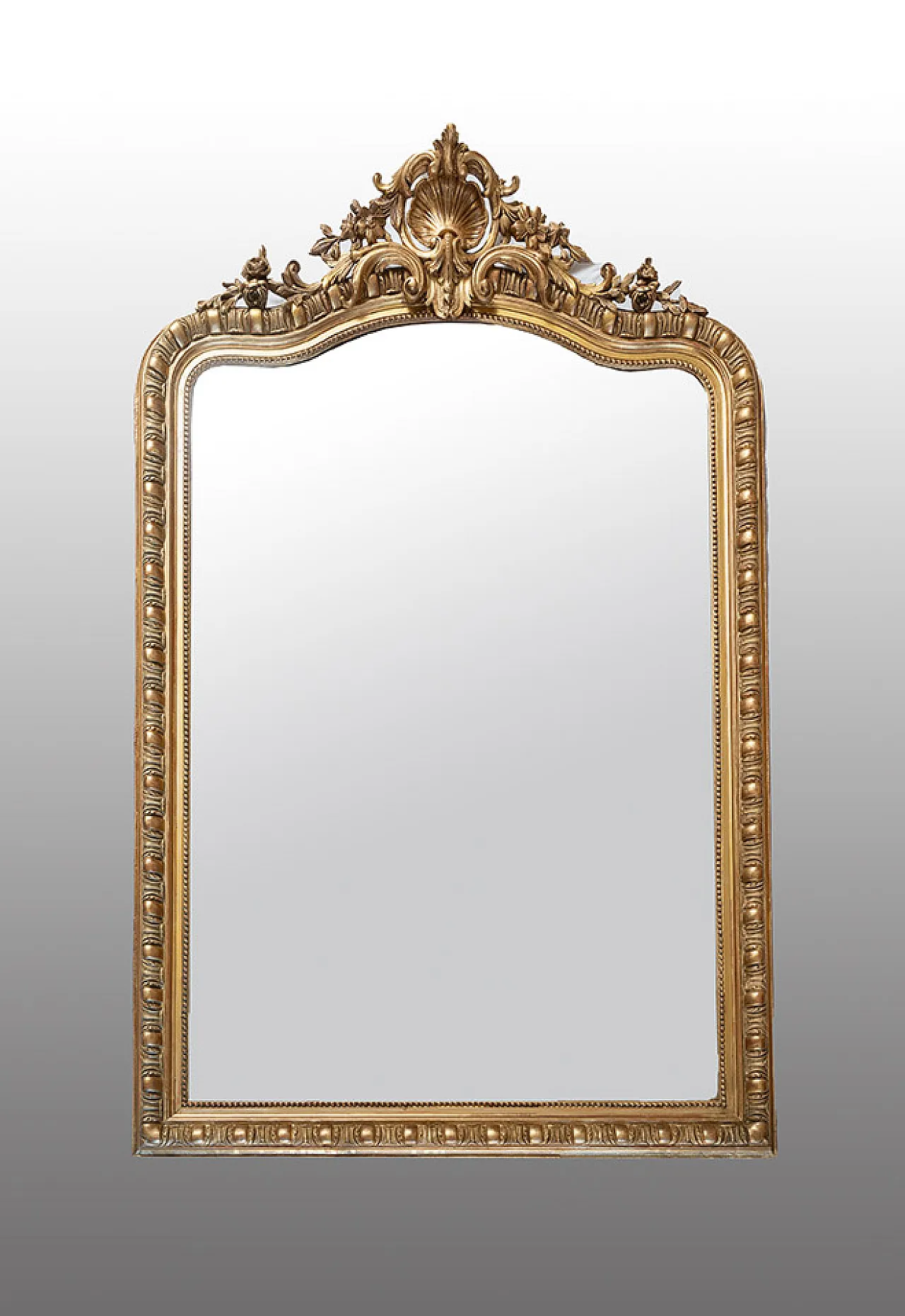 Ancient mirror Napoleon III French in golden and carved wood. 1
