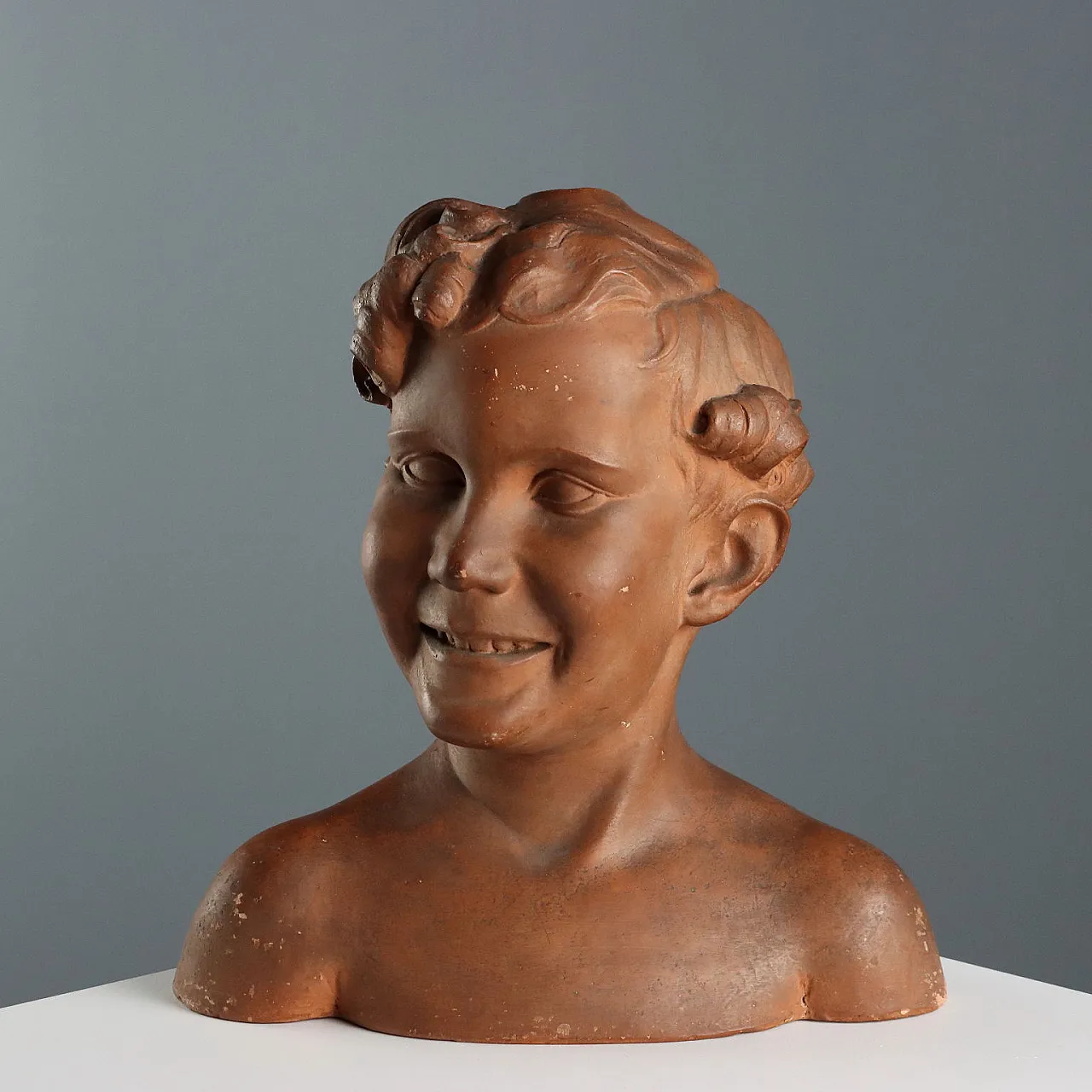 Bust of boy in yerracotta by A. Menchi Art, 20th century 1