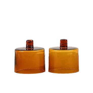 Pair of amber glass cloches, mid-20th century