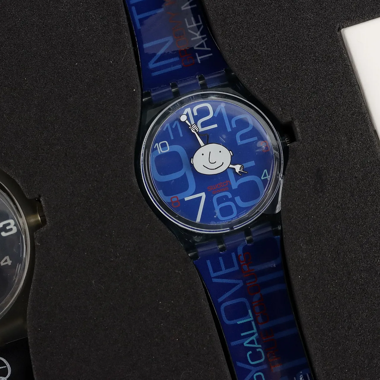 2 Swatch Wake Up Call Phil Collins watches, late 20th century 