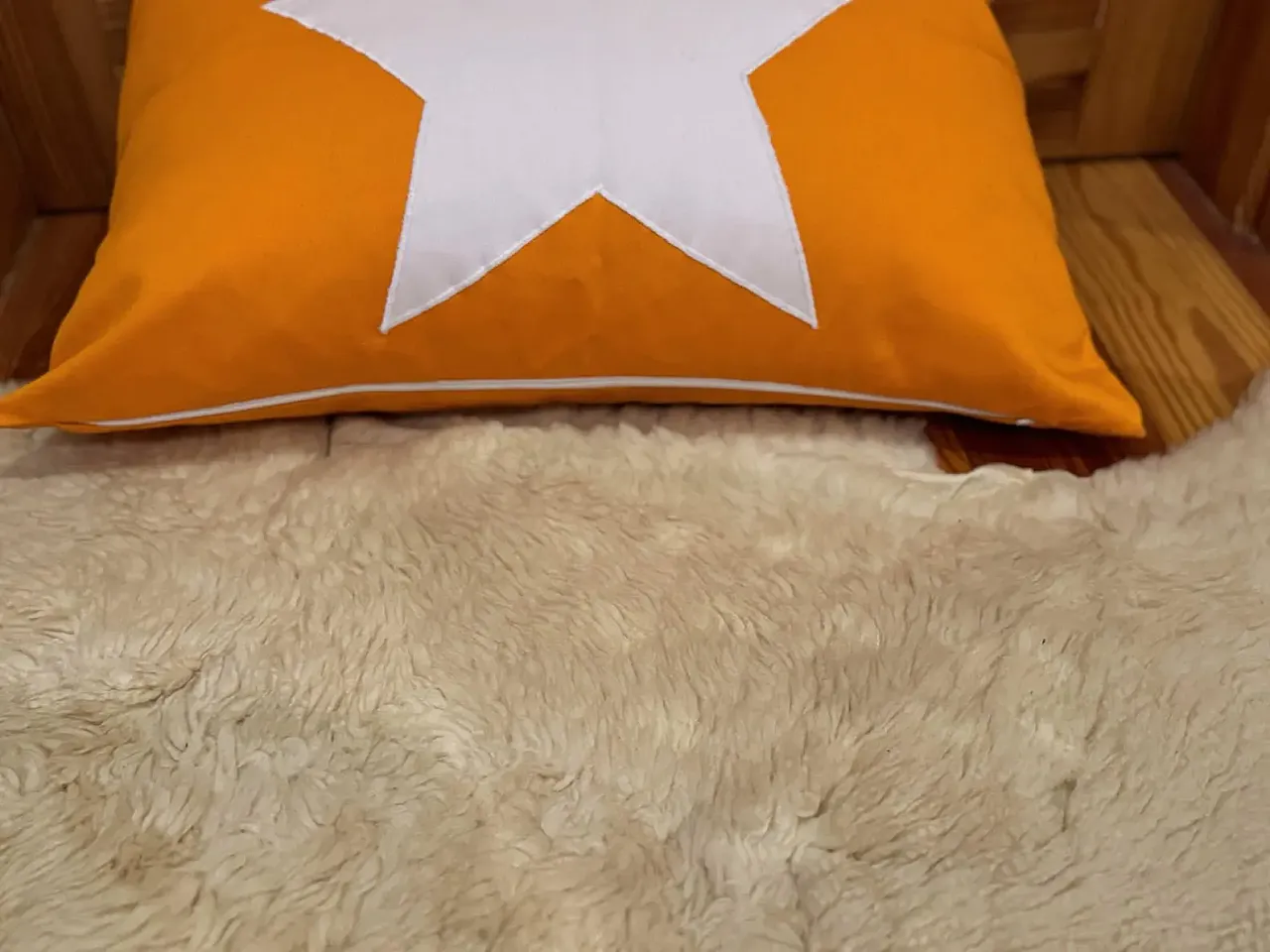 Yellow fabric pillow with white star, 2000s 4