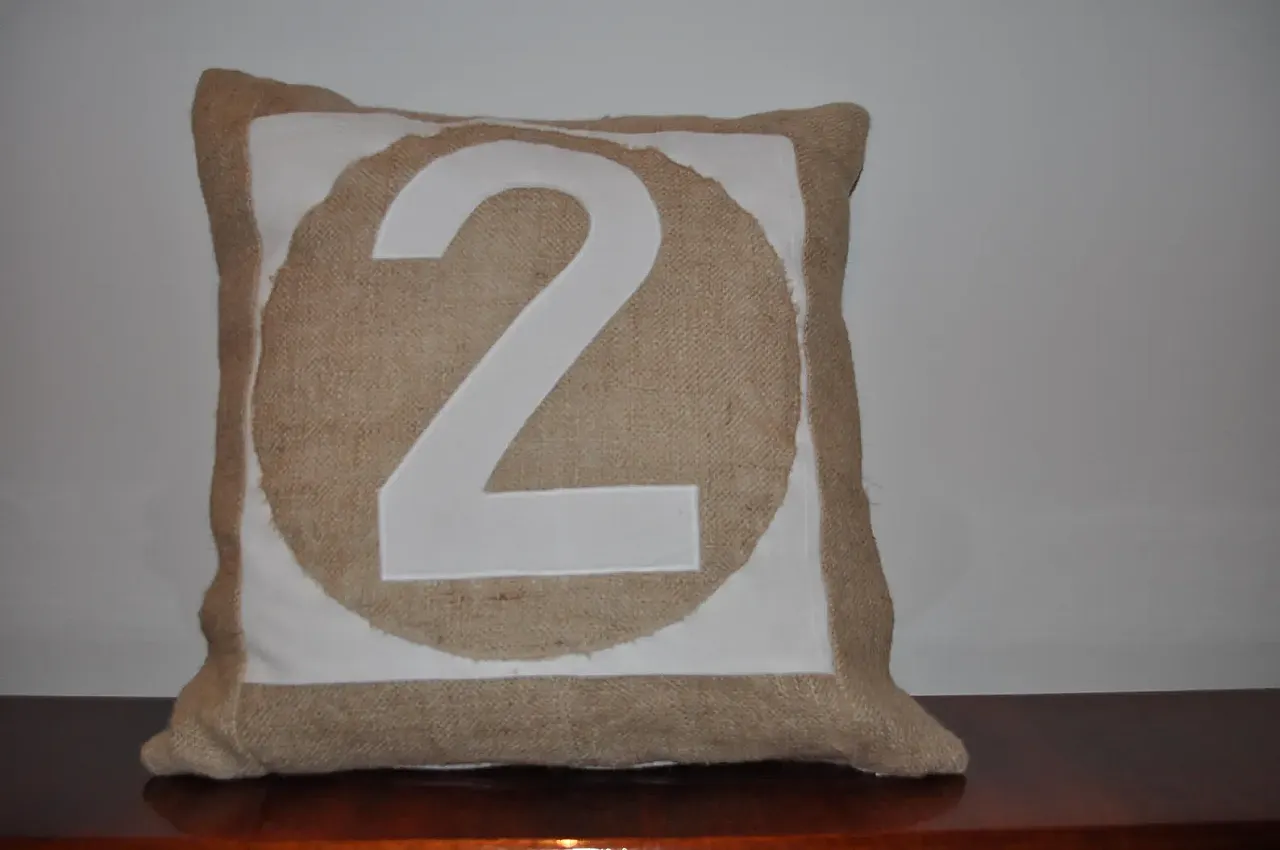 6 cushions with numbers 1, 2, 7, 2000s 5