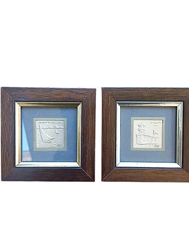 Pair of silver and gold paintings, 20th century