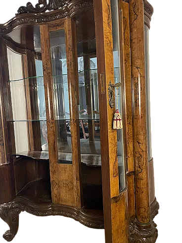 Walnut burl display cabinet with decorative carvings, 20th century