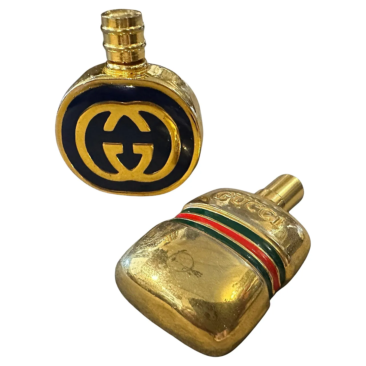 Pair of brass and enamel perfume bottles by Gucci, 1980s 1