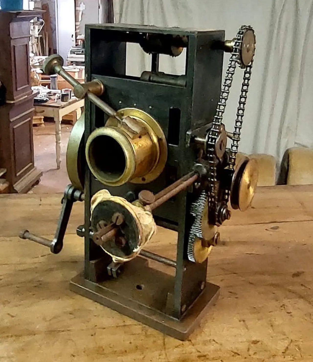Hand-cranked movie projector, early 20th century 9
