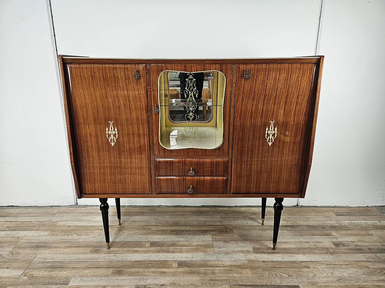 Mid Century showcase covered in mahogany with glass top 1