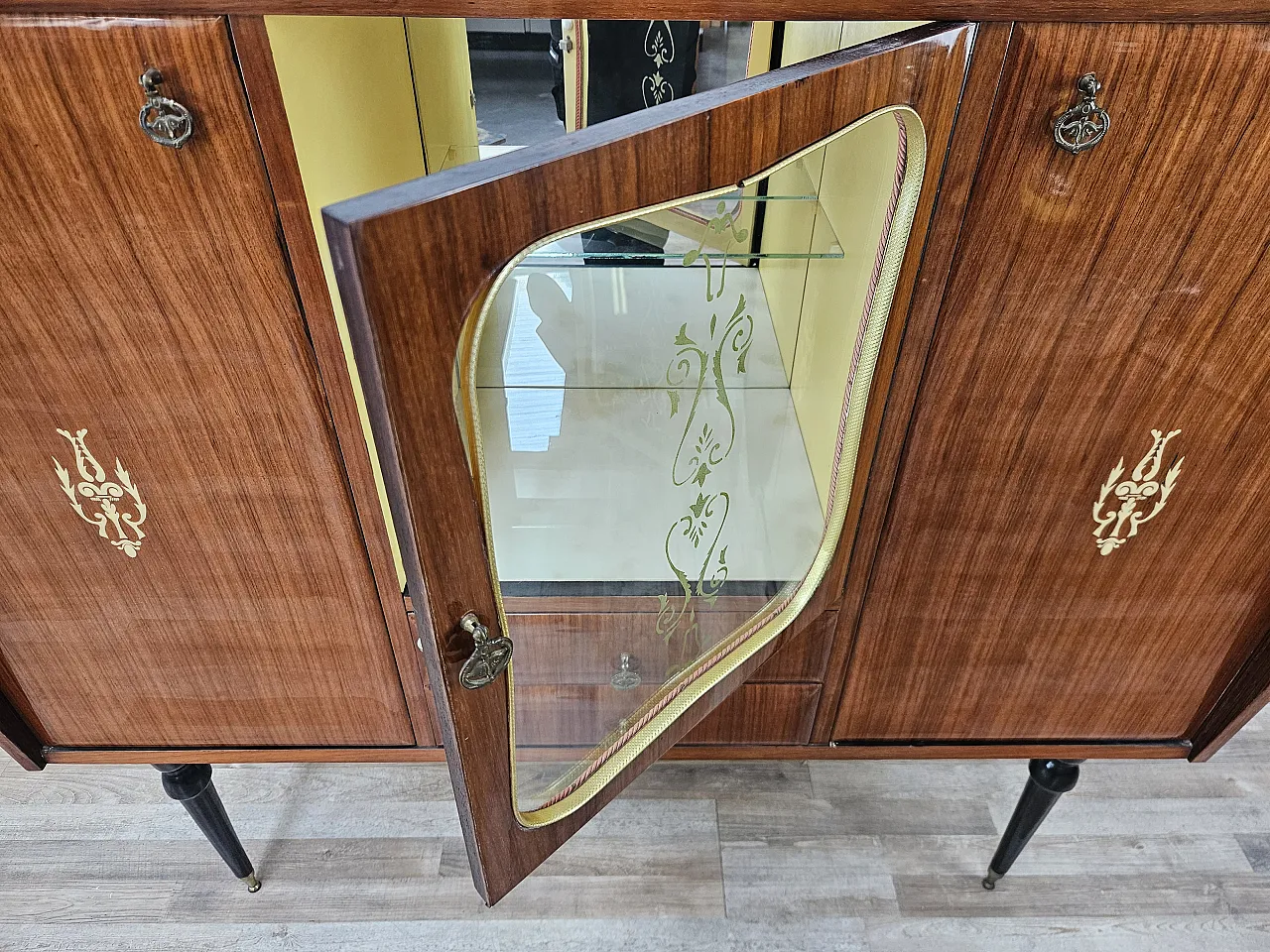 Mid Century showcase covered in mahogany with glass top 16