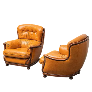 Pair of brown and wood leather armchairs, 50s