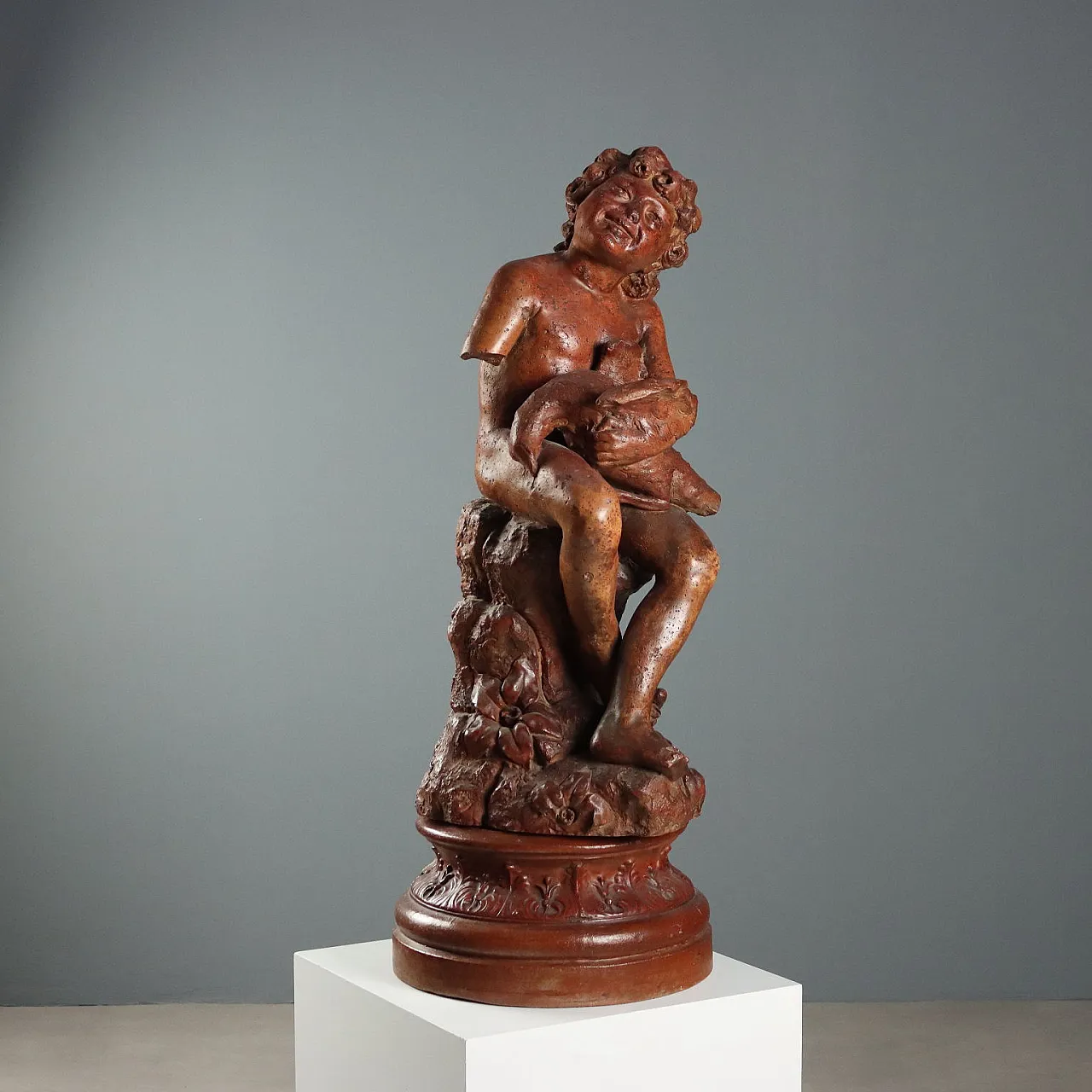 Patinated terracotta sculpture depicting boy with dove, 20th century 2