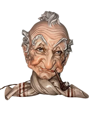 Lampada, testa anziano Capodimonte