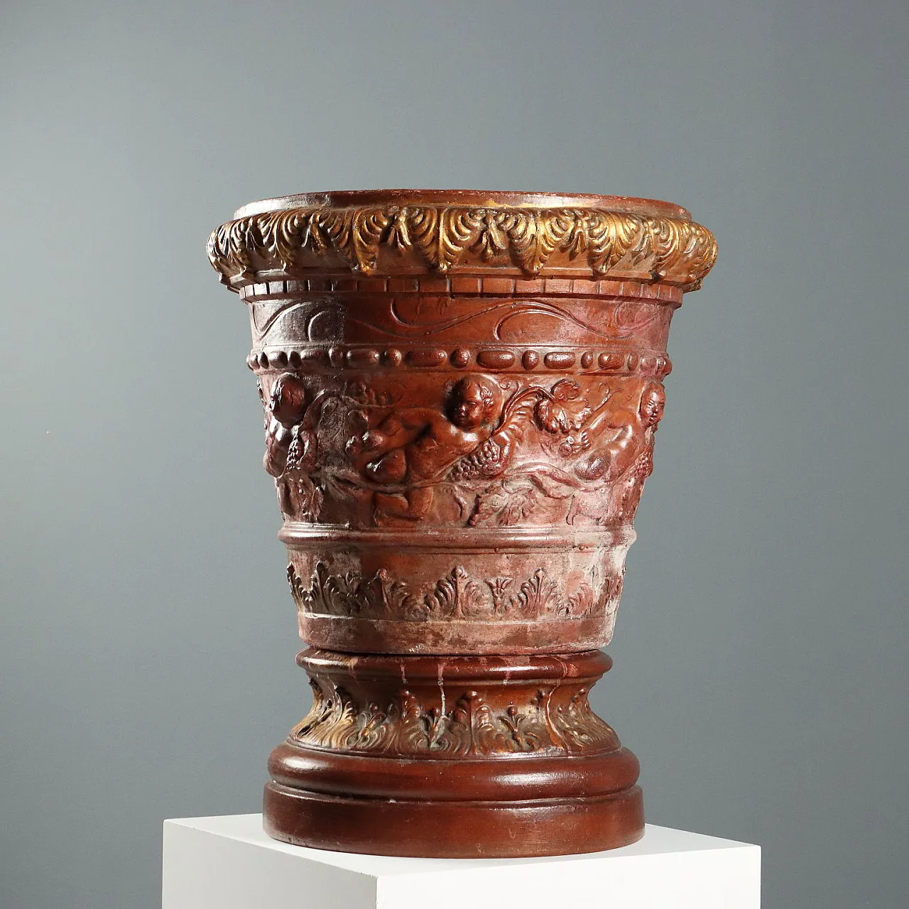 Patinated gilded terracotta vase with vegetal decorations,20th century 1