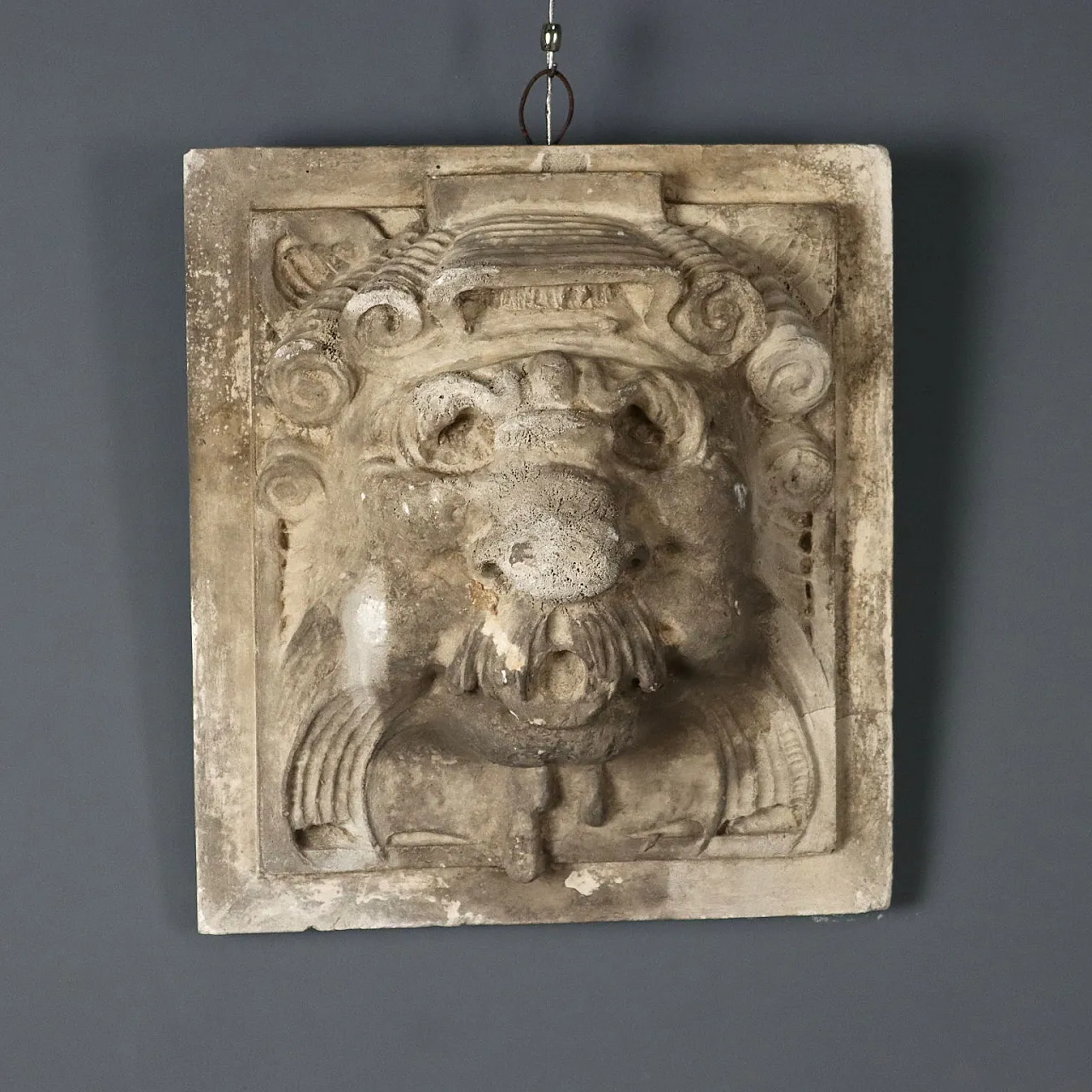 Plaster tile depicting a ferine mask, 19th century 1