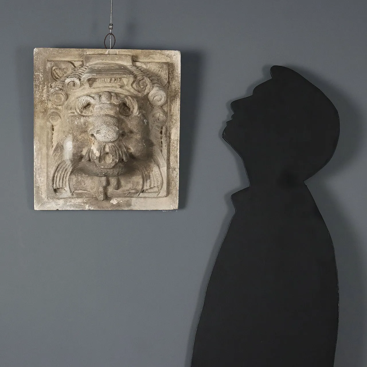 Plaster tile depicting a ferine mask, 19th century 2