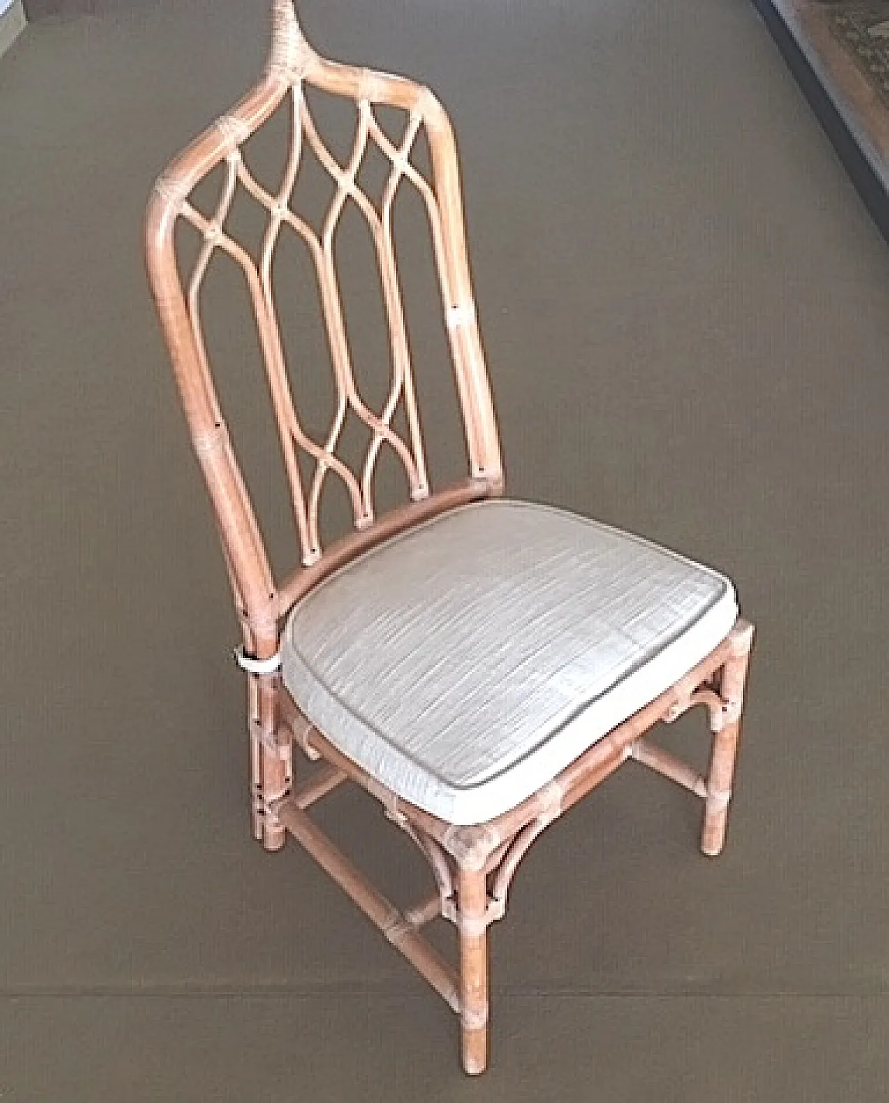 8 chairs by McGuire USA in rattan and parchment leather, 90s 2