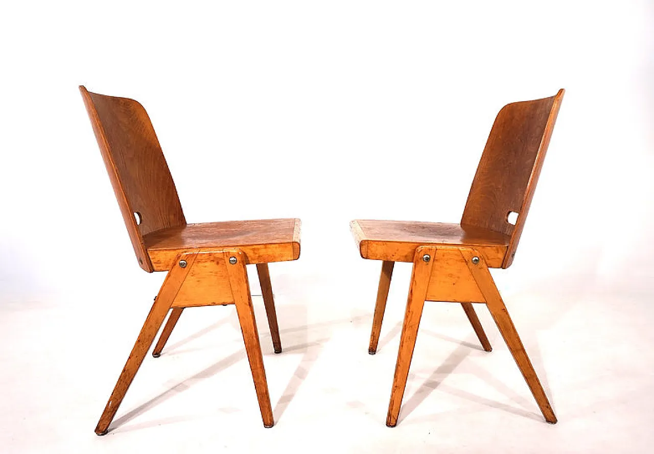 Coppia di sedie da pranzo impilabili in compensato, anni '60 11