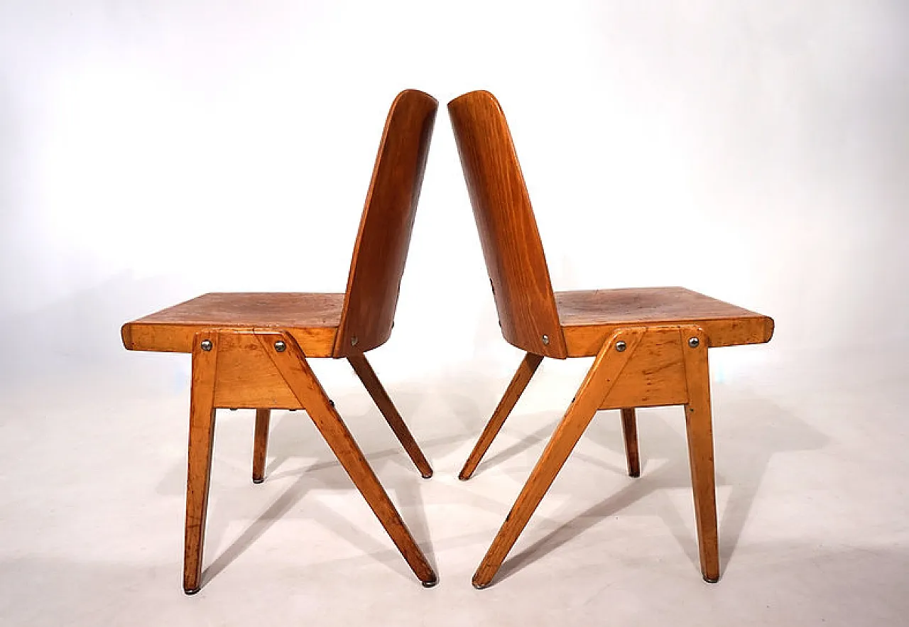Coppia di sedie da pranzo impilabili in compensato, anni '60 12