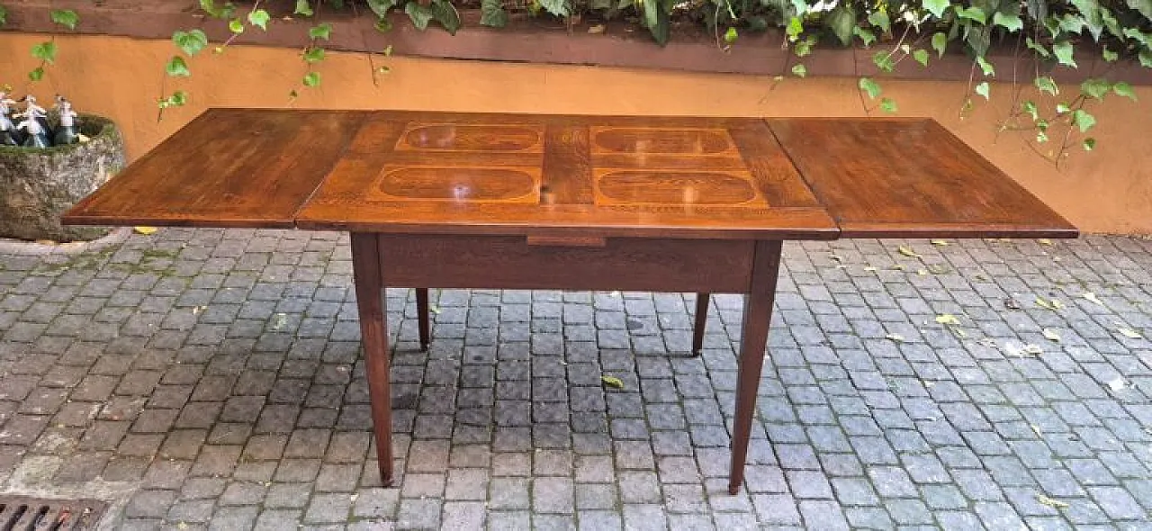 Extendable wooden table with ovals, 19th century 1