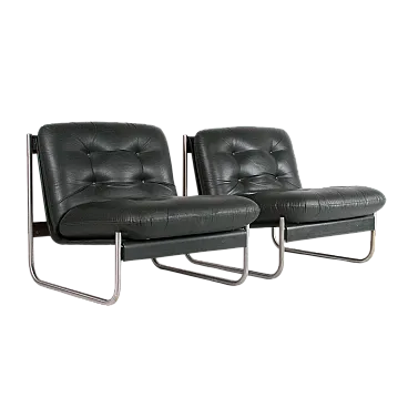 Coppia di poltrone in legno e pelle, anni '70