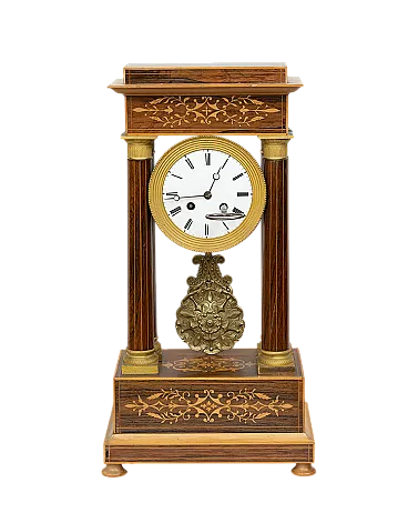 Charles X clock in precious exotic woods, 19th century