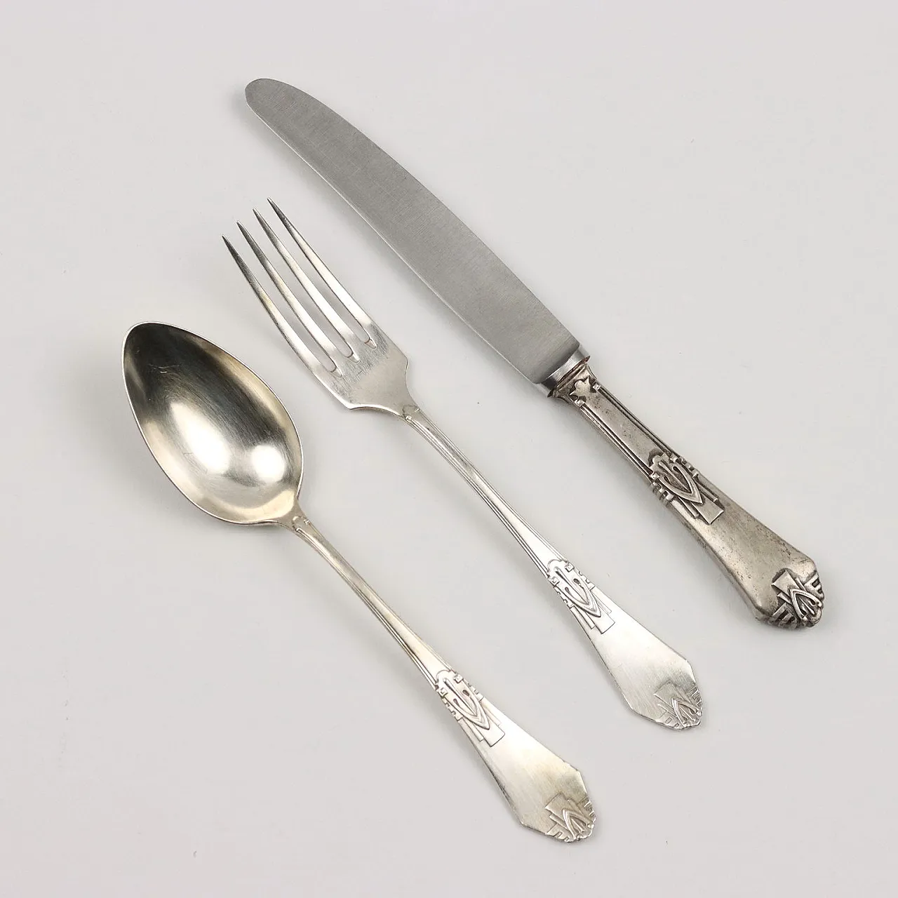 Servizio di posate in argento per sei con motivo in rilievo, '900 7