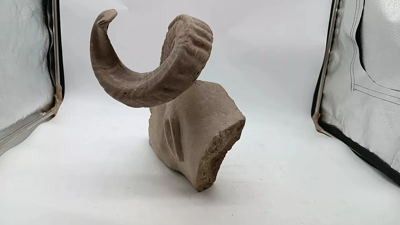 Serene stone hanging sculpture depicting ram head, 20th century 7