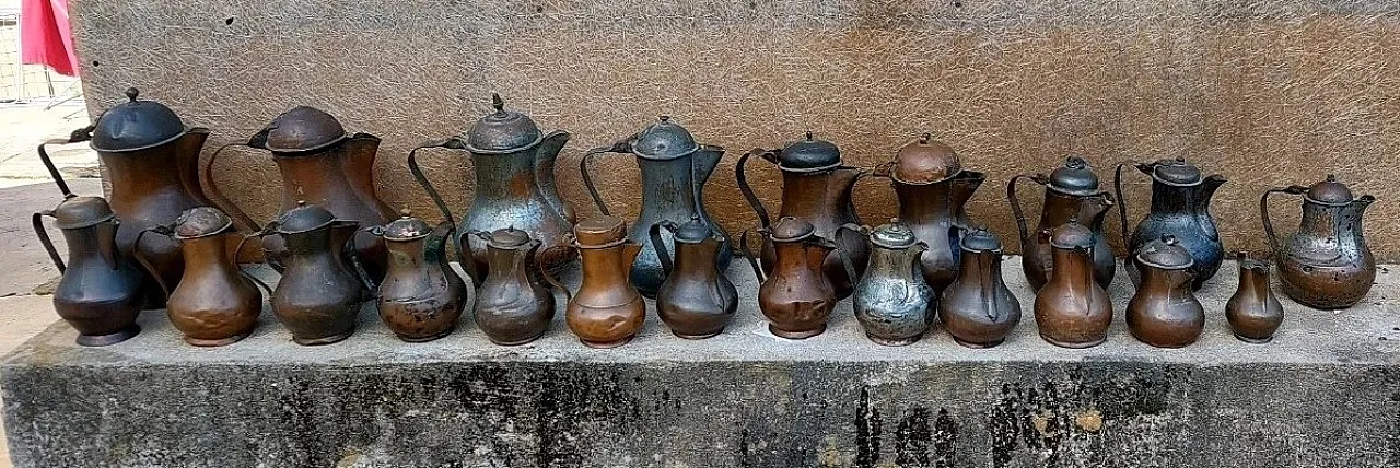 22 Copper jugs, 18th century 11