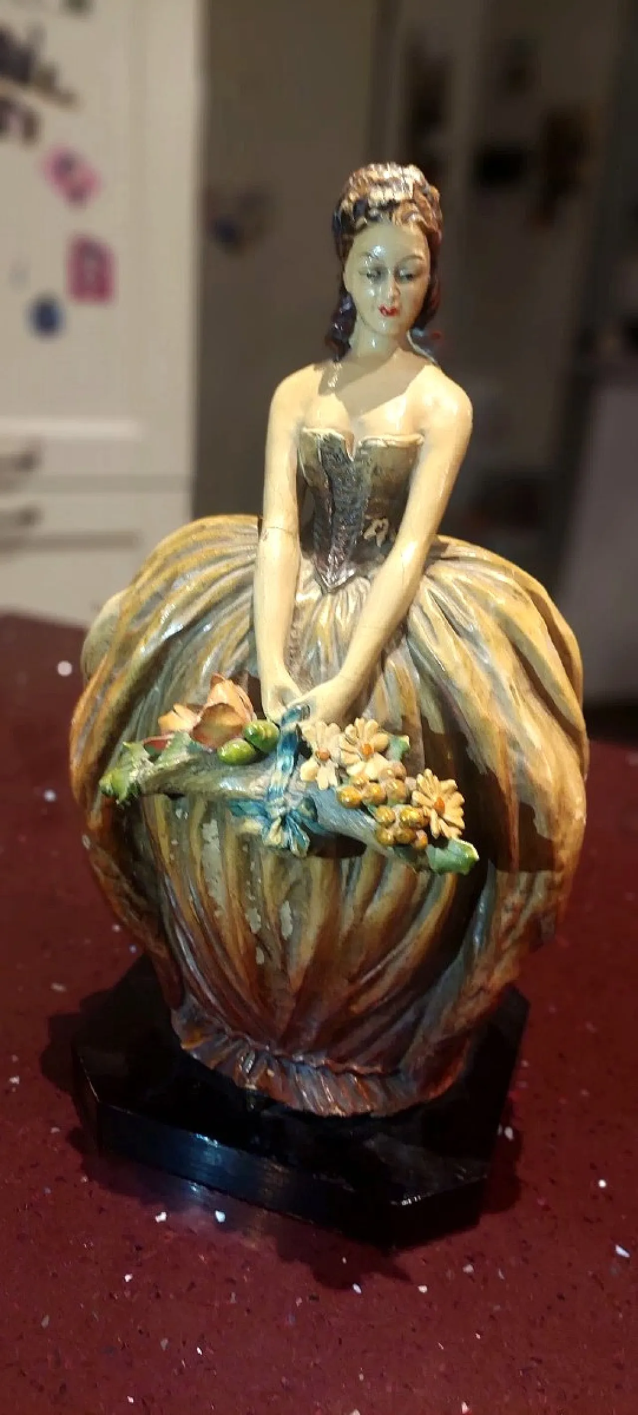 Lady with painted terracotta flowers, 1930s 2