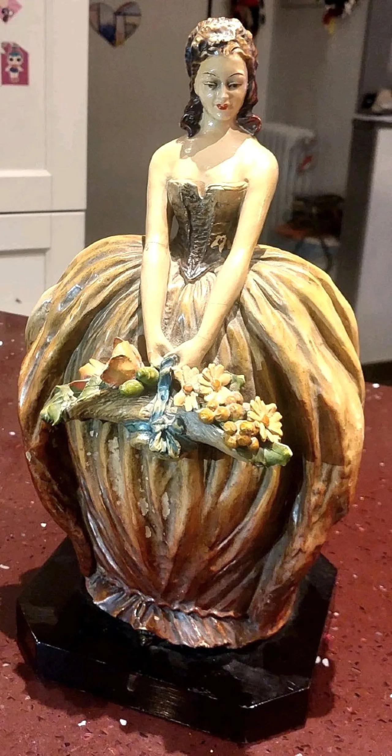 Lady with painted terracotta flowers, 1930s 3