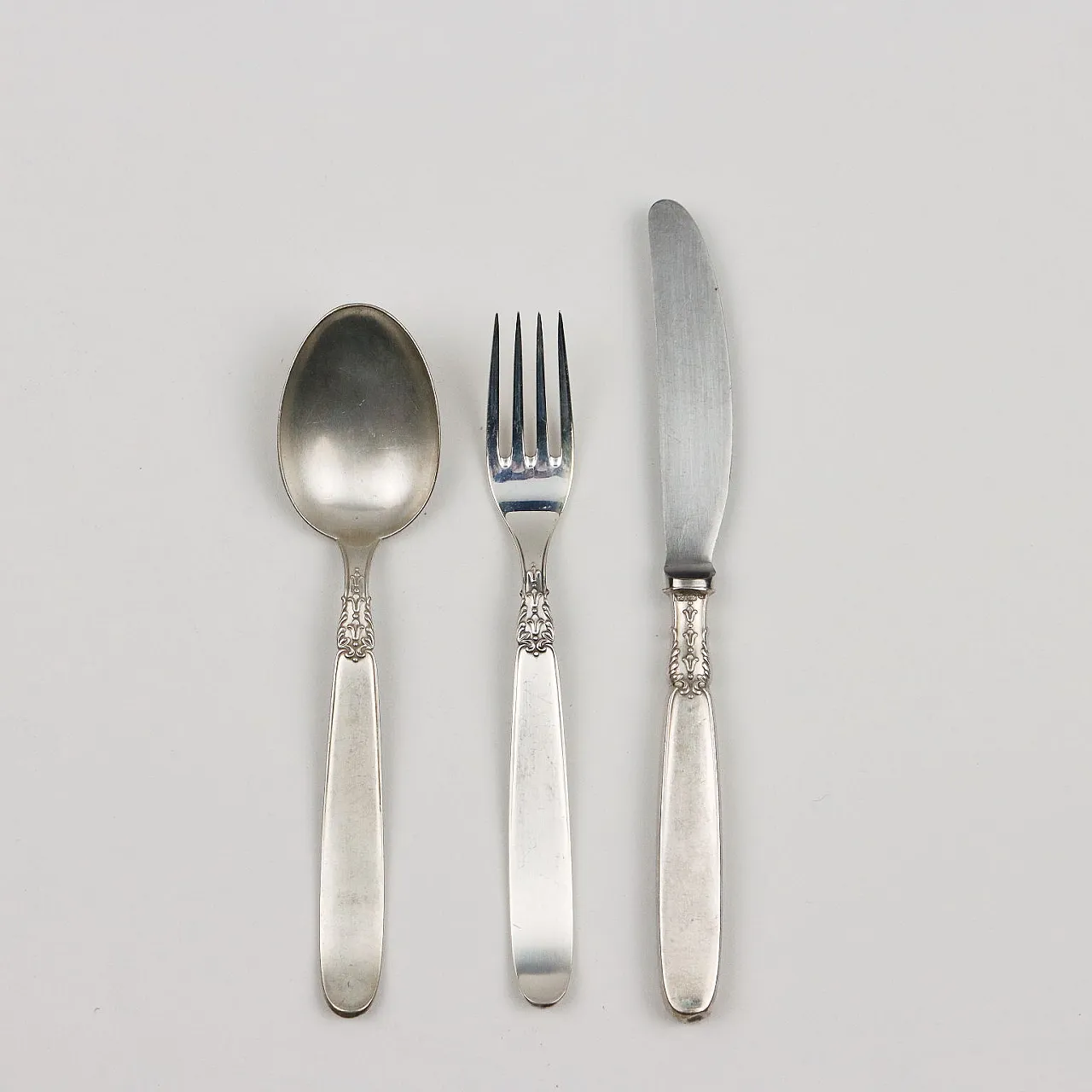 Servizio di posate in argento inciso, '900 6