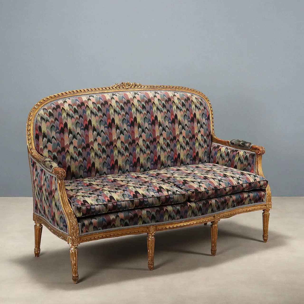 Carved and gilded wooden sofa with padding, late 19th century 1