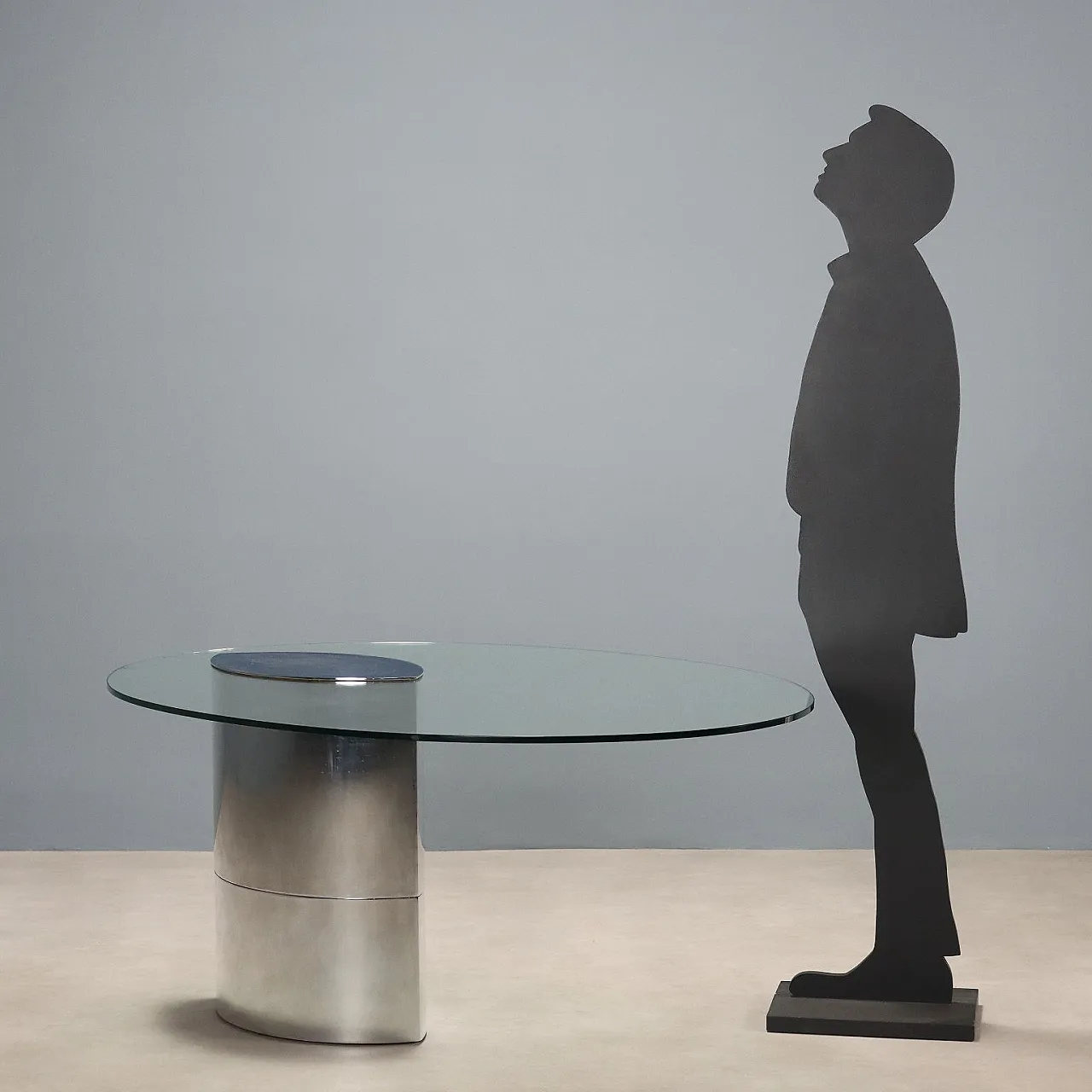 Tavolo con piano in vetro e base in acciaio stampato, '900 2